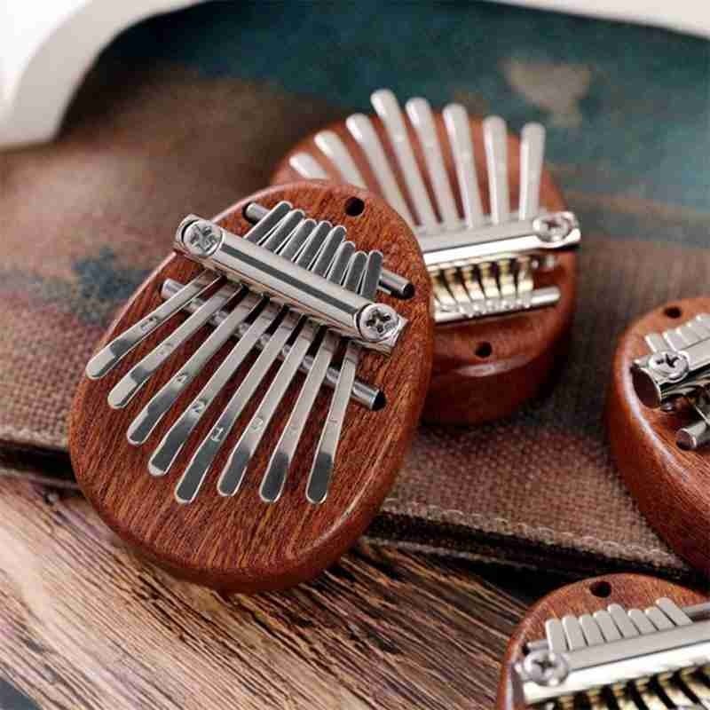 Piano à Pouce Kalimba, Piano à Doigt en Bois Massif, Portable Musique Thumb  Piano, Pouce Doigt Piano, Portable Instrument de Musique, Piano à Pouce  Portable, 8 Clés, Goutte : : Instruments de